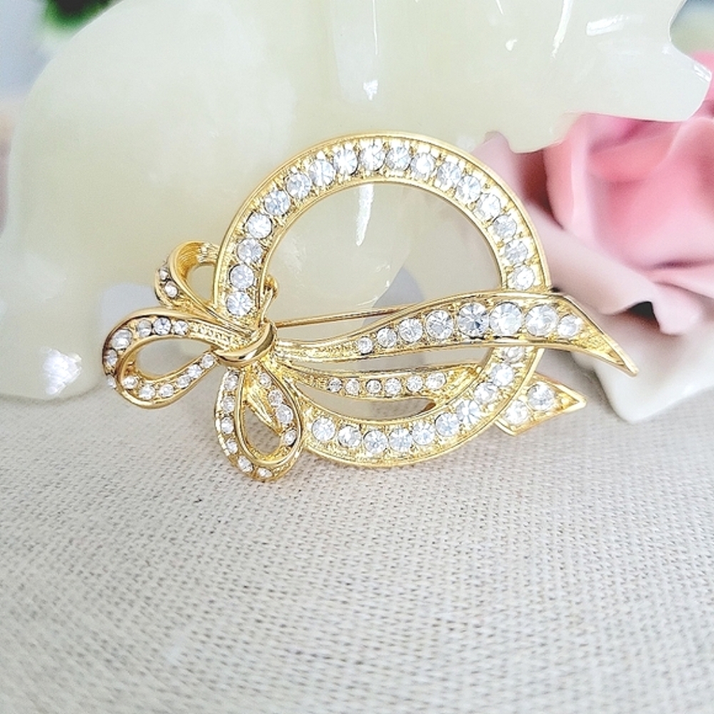 VINTAGE Nolan Miller crystal bow brooch